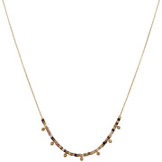 This beautiful necklace is designed to be layered with other styles and looks beautiful on its own, too. It's handmade using a 14 k gold filled chain, vermeil bead charms and japanesse glass beads.      14 K gold filled chain and clasp closure     Vermeil beads charms     Measures 43cm + 2cm extension     Handmade necklace     Japanesse glass beads