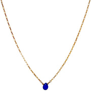 This delicate necklace is designed to be layered with other styles and looks beautiful on its own, too. It's handmade using a 14 k gold filled chain and a chalcedony semi-precious stone as a center piece.      14 K gold filled chain and clasp closure     Measures 38cm + 2cm extension     Handmade necklace     Chancedony semi-precious stone