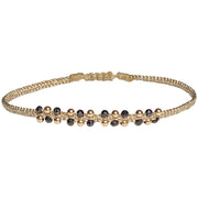 This stunning Nora bracelet will look great on everyone. It can be worn from day to night and, with the dramatic centre of 14K gold filled beads, it will illuminate any look. It has been handwoven in Colombia by our team of artisans and features an adjustable pull cord to ensure the perfect fit for all wrists.      14K gold filled beads     Handwoven metallic threads     Adjustable pull cord     Width 4mm     Take care of your jewellery by keeping it dry and avoid spraying fragrances directly on to it.