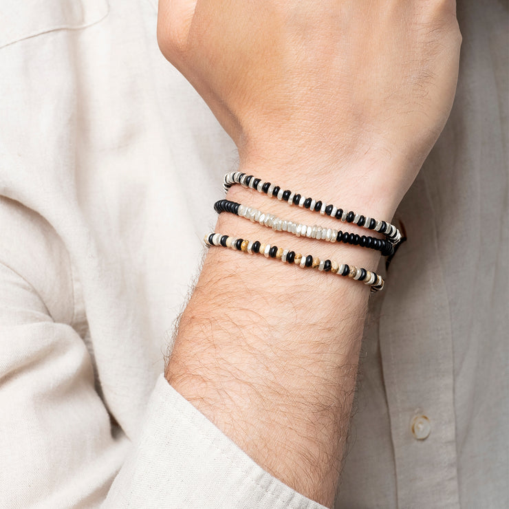 This cool bracelet is handmade by our team of masters artisans with black onyx stones, sand jasper stones and silver beads. A great gift idea for someone special as this amazing design it is a fashion must have.  Details:  -Men&