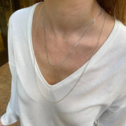 This curb trace chain neckace is a jewellery box basic, delicate and chic. Wear alone, stack with other necklaces or add your favorite pendant.  Details:  Handmade necklace  Total necklace circumference 50 cm + extension chain 2cm  925 sterling silver  Handcrafted in Colombia  Take care of your jewellery by keeping it dry and avoid spraying fragrances directly on to it. 