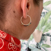 Chic & Elegant, Casual & Versatile.  Elevate your look with these gorgeous hoops.  Details:  - Handmade earrings  -  925 sterling silver hoops  -Hoop diameter: 25mm   -Intermixed semiprecious stones  